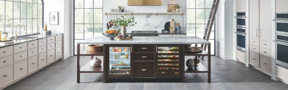 large modern farmhouse style kitchen featuring luxury Monogram undercounter refrigerator appliances